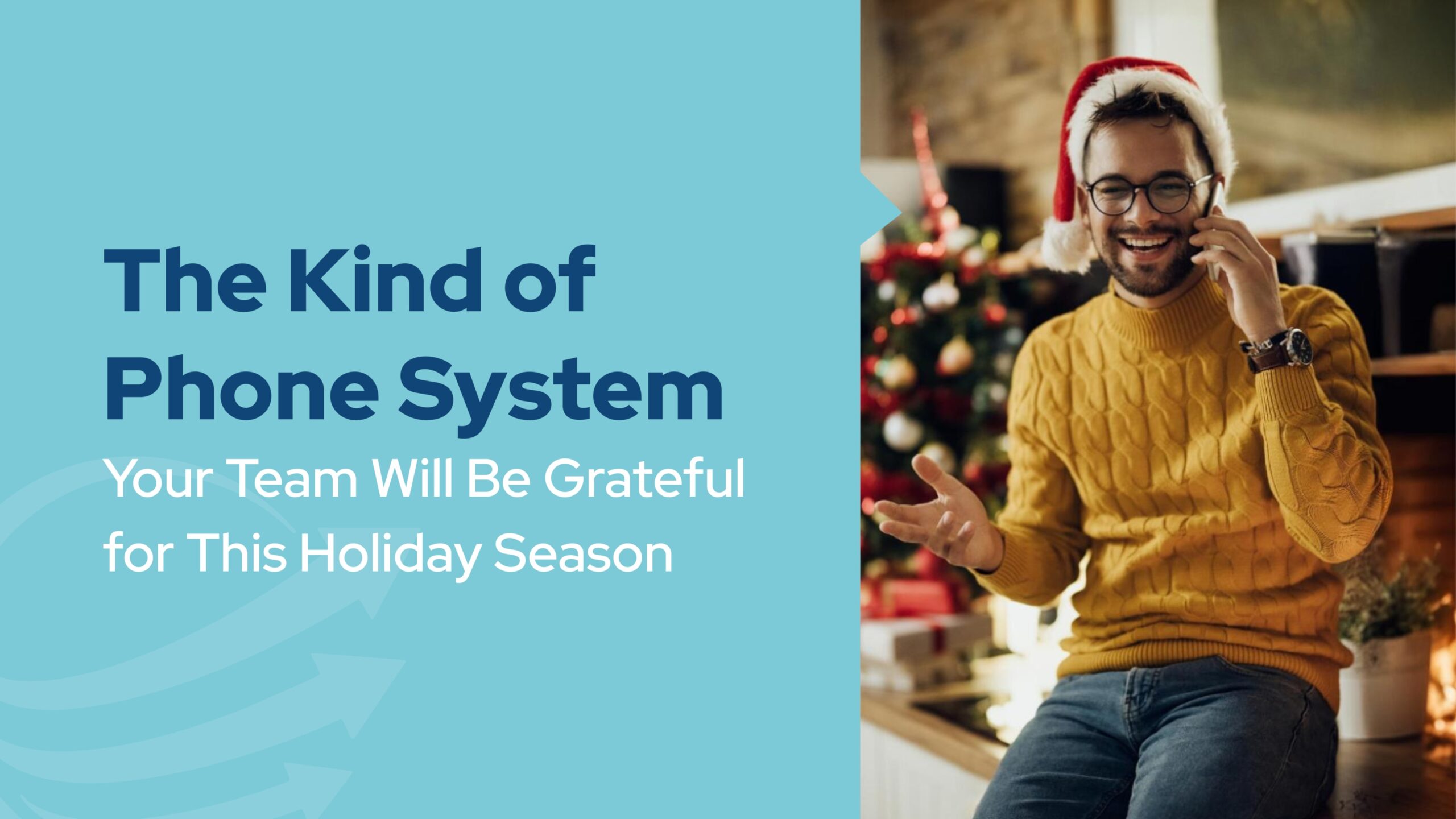 Smiling man wearing a Santa hat and talking on the phone during the holidays, representing how a small business phone system supports team communication during busy seasons.